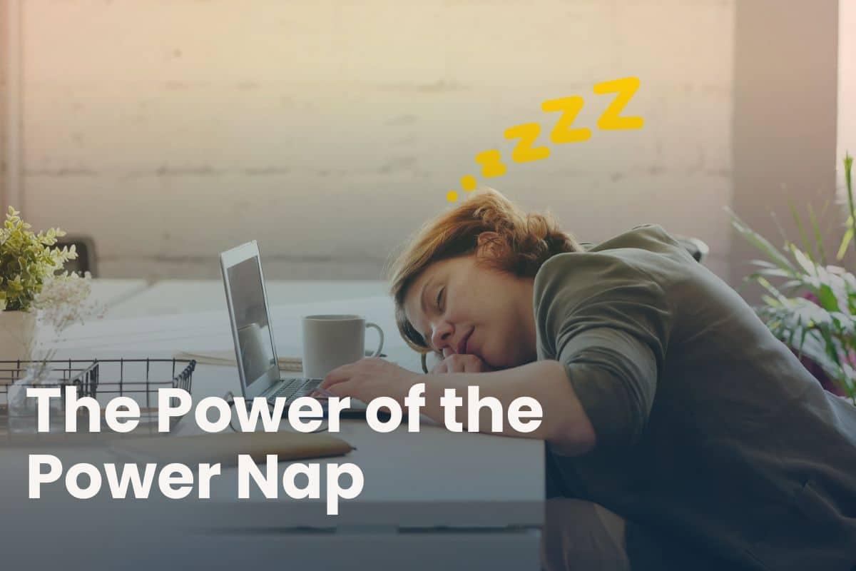 The Power of power naps: A Woman napping at her white desk with 'zzz's' and 'The Power of the Power Nap' text overlaid on the image.