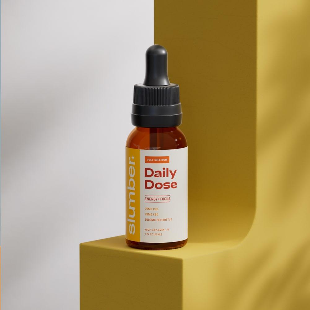 A 'Daily Dose CBD CBG Tincture' bottle on a minimalist beige and yellow stand, embodying a modern and health-conscious aesthetic for daily wellness support with a 1:1 ratio of 1500mg CBD and CBG.