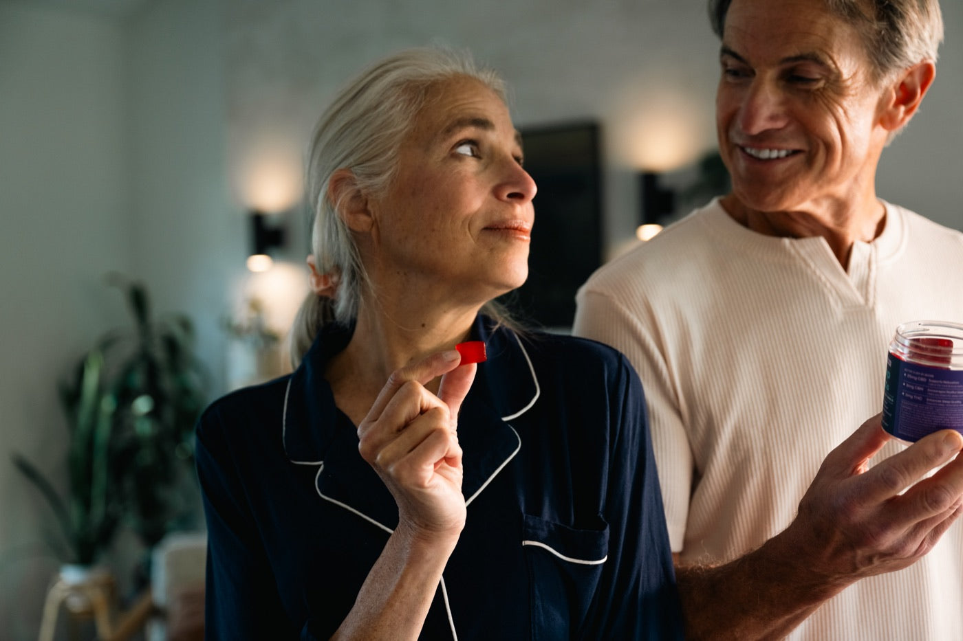Older couple smiling together at home before bedtime